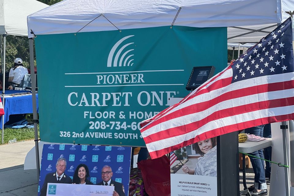 Pioneer Carpet One tent, hat sale for T2T